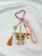 Porte-clés cochon jaune et marron claire Lolipets Memories